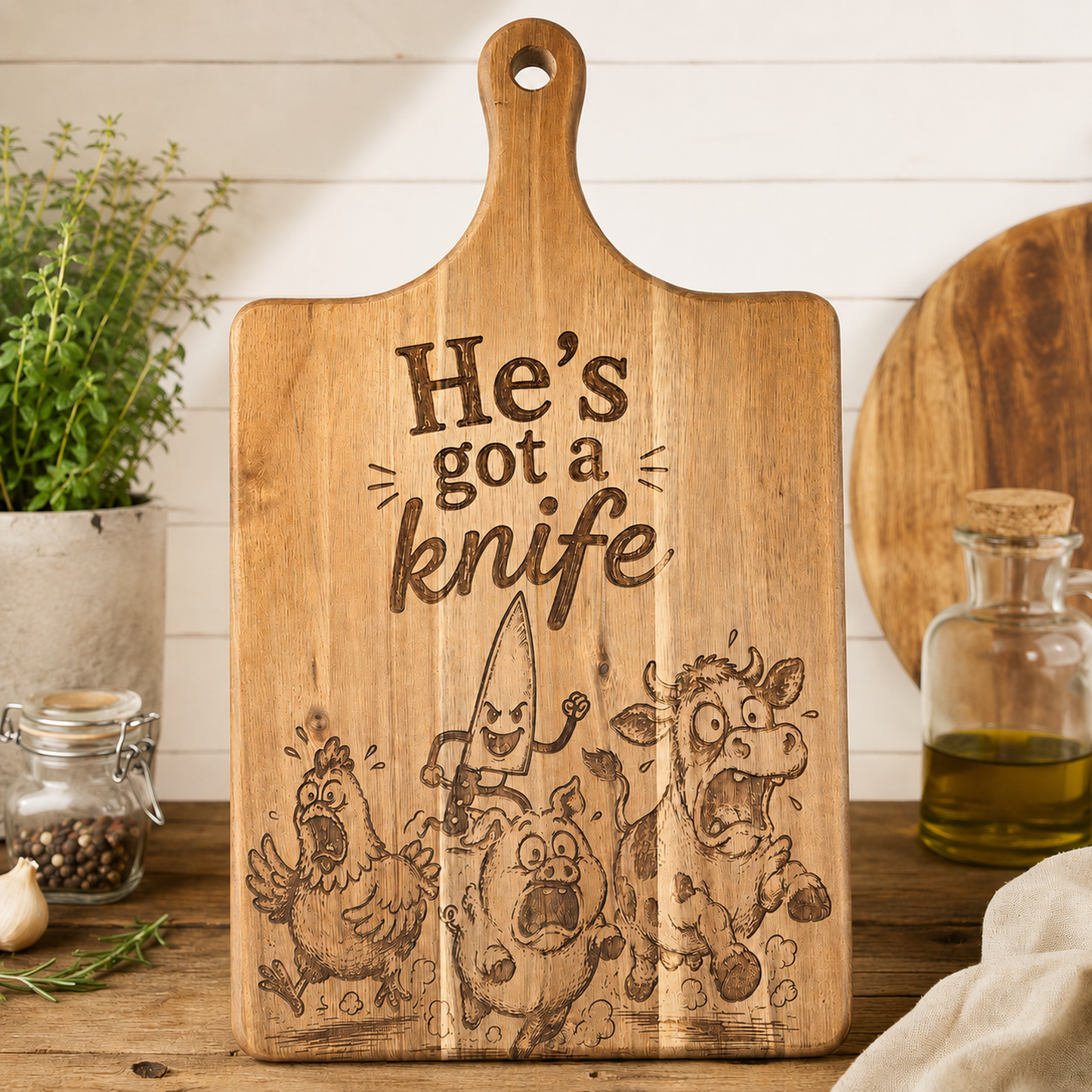 He's got a Knife Acacia Cutting Board - 15.9" x 8.9"